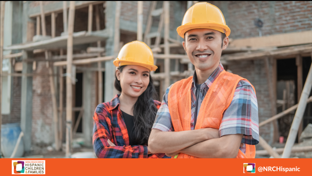 Construction works standing smiling at camera